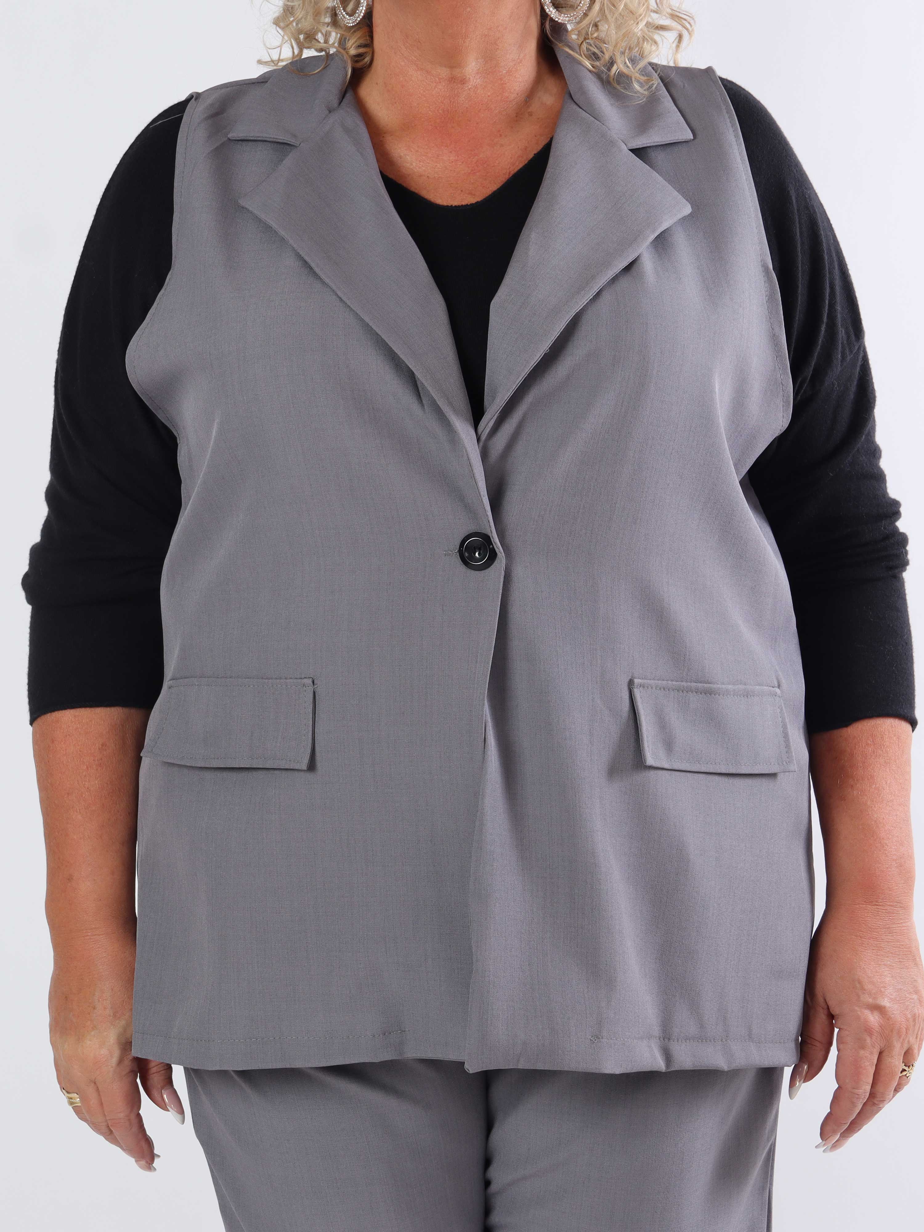 Shadia Vest - Enfärgad kostymväst med knapp och